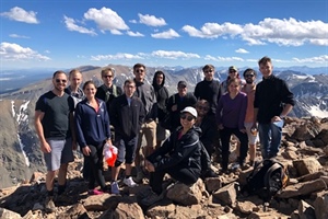 A group of students and instructors hike to the summit of Quandary Peak, one of the 14,000-foot mountains near Breckenridge, Colo., during the 2018 Gene Golub SIAM Summer School. Photo credit: Georg Stadler.