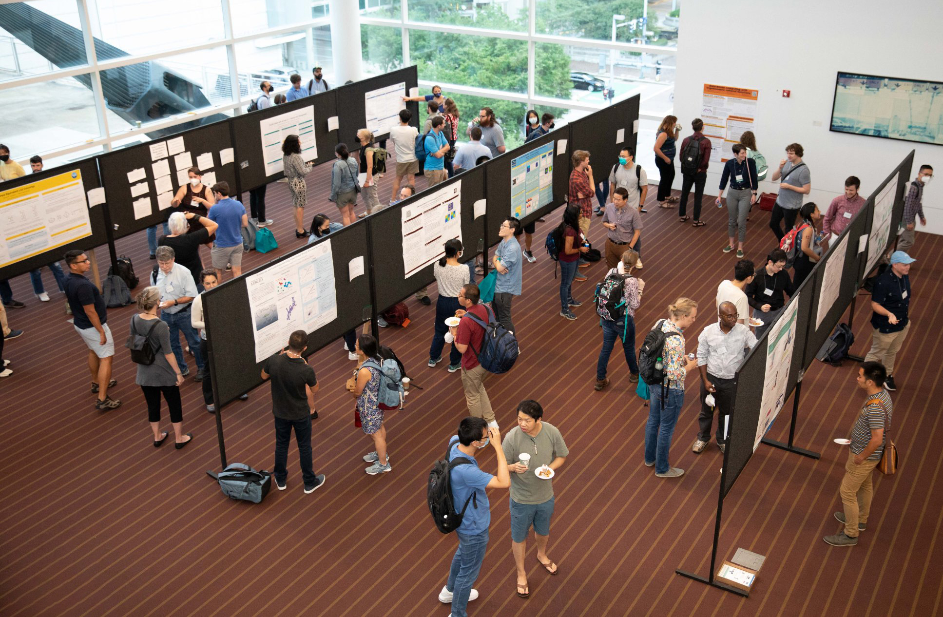 Attendees enjoyed an interactive poster session at the 2022 SIAM Annual Meeting, which was held in Pittsburgh, Pa., in July 2022. During the 2024 SIAM Annual Meeting, which will take place in Spokane, Wash., this July, the Poster Session and Dessert Reception will allow conference-goers and presenters to mingle and discuss cutting-edge research across a wide variety of mathematical areas. SIAM photo.