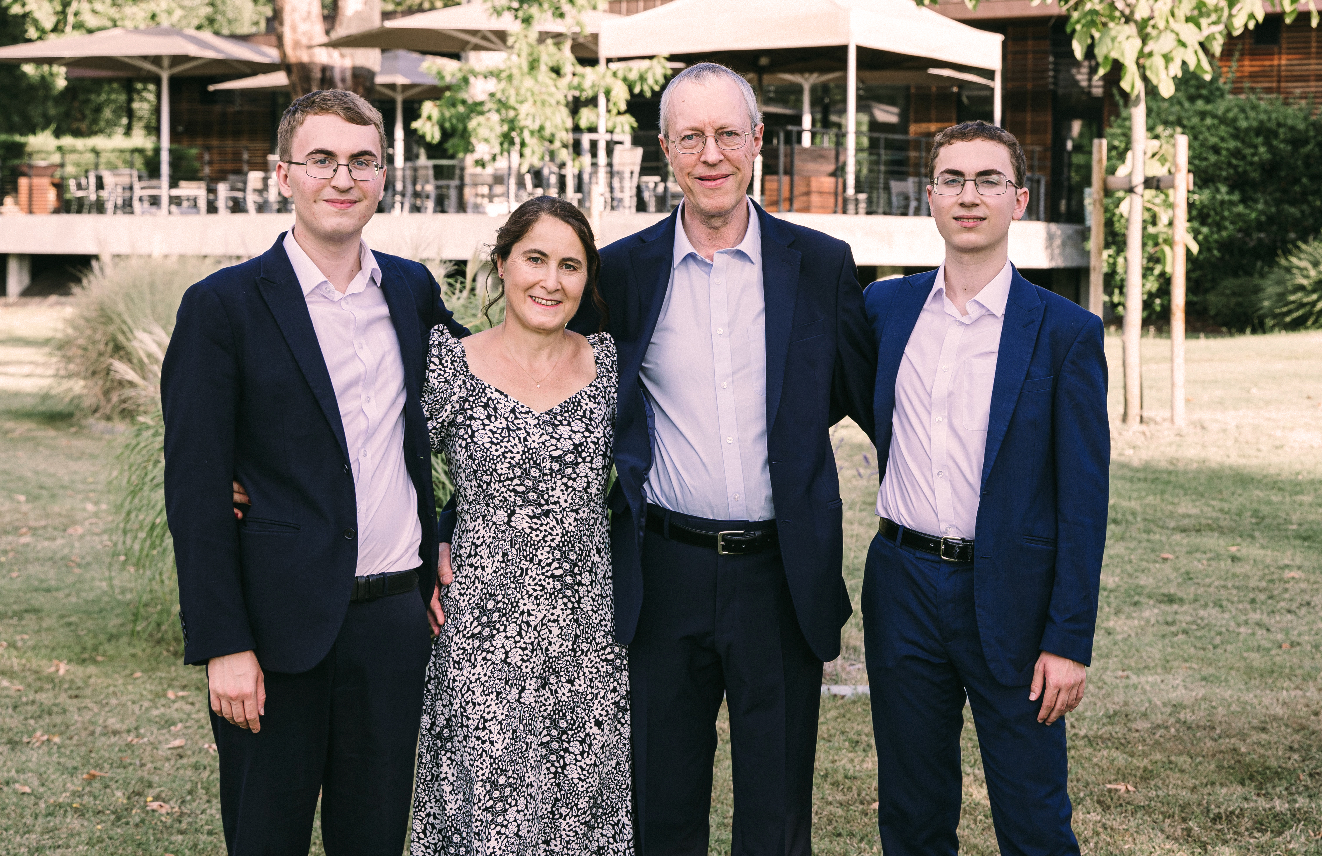 Nick Higham spends quality time with his wife and sons at a family wedding in 2023. From left to right: Thomas Higham, Françoise Tisseur, Nick Higham, and Freddie Higham. Photo courtesy of Jérémie Laye Photography.