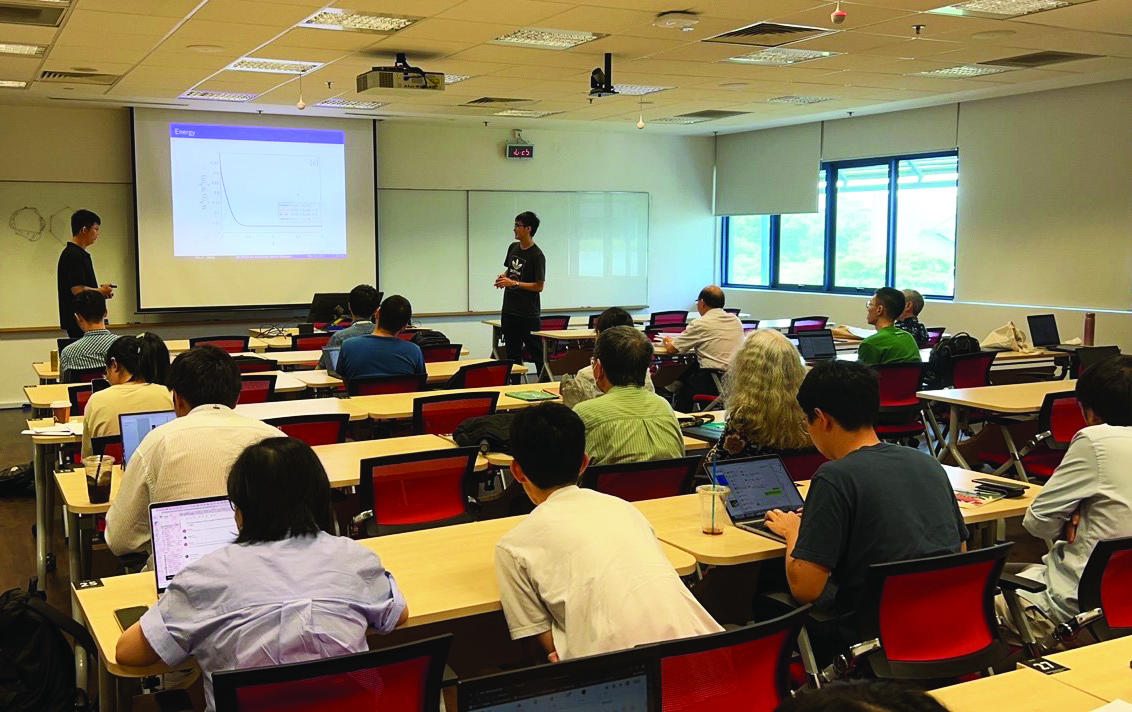 During the 12th Symposium of the SIAM Student Chapter at the National University of Singapore (NUS), which took place in May 2023, Yifei Li of NUS answers audience questions after his talk about “A Symmetrized Parametric Finite Element Method for Anisotropic Surface Diffusion.” Photo courtesy of Di Hou.