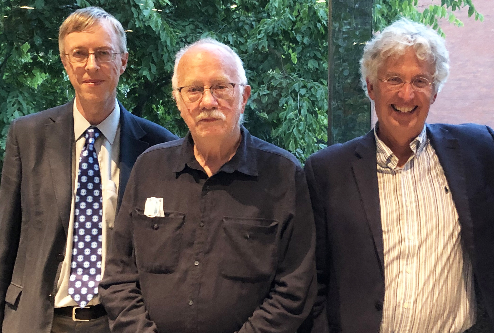 From left to right: Nick Higham, George Hall of the University of Manchester (Nick’s Ph.D. supervisor), and Charlie Van Loan of Cornell University gather for a photo at the conference on “Advances in Numerical Linear Algebra: Celebrating the 60th Birthday of Nick Higham,” which was held in July 2022 at the University of Manchester. Nick is wearing a Bohemian matrix eigenvalue tie, which was a gift from Rob Corless of the University of Western Ontario. Photo courtesy of Desmond Higham.